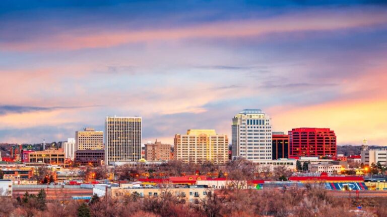 Colorado Springs, Colorado, USA downtown city skyline at dawn.